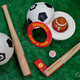 Illustration for article titled A Matryoshka Bat and Ball Hide a Gym Class Worth of Sports Gear